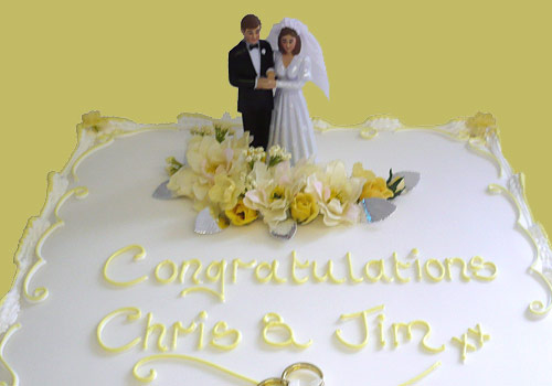 A 'traditional' type Wedding Cake with bride and groom figures on top